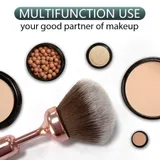 Cosmetic Pen brush head beside open powder compacts and makeup containers on a white background