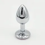 YB26 anal plug standing upright on white, showing a reflective silver-coloured surface, tapered body, narrow neck and round base