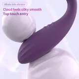 Close-up of the purple Whale tide vibrator showing its ridged body and curved contact surface